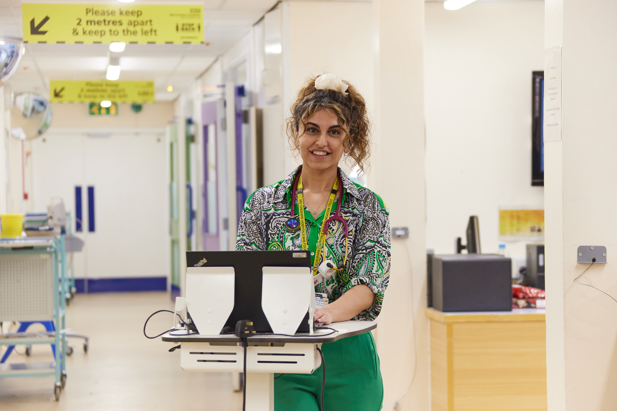 Female Junior Doctor smiling towards camera 2.jpg