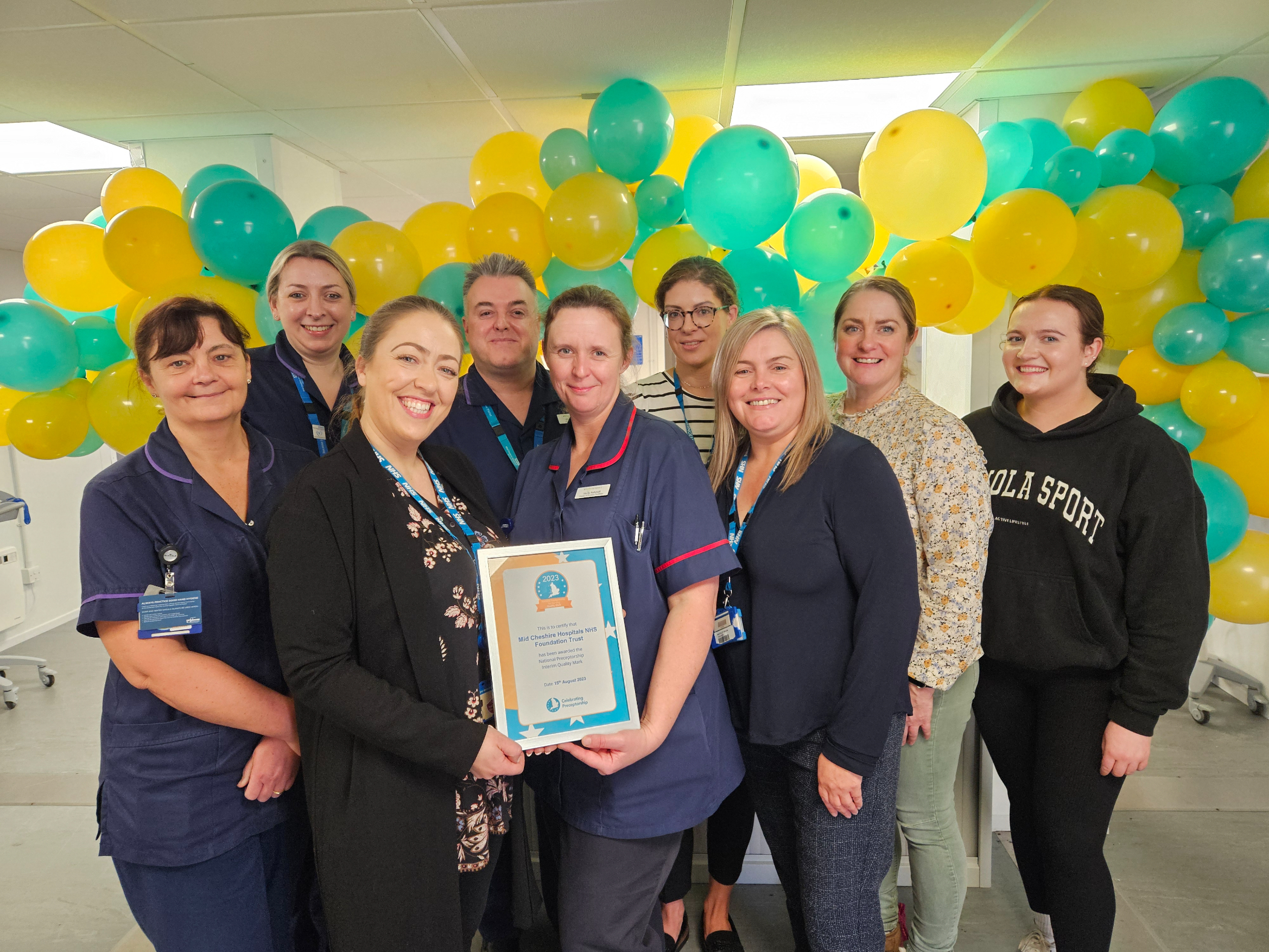 Mid Cheshire Hospitals staff celebrate the Interim Quality Mark.