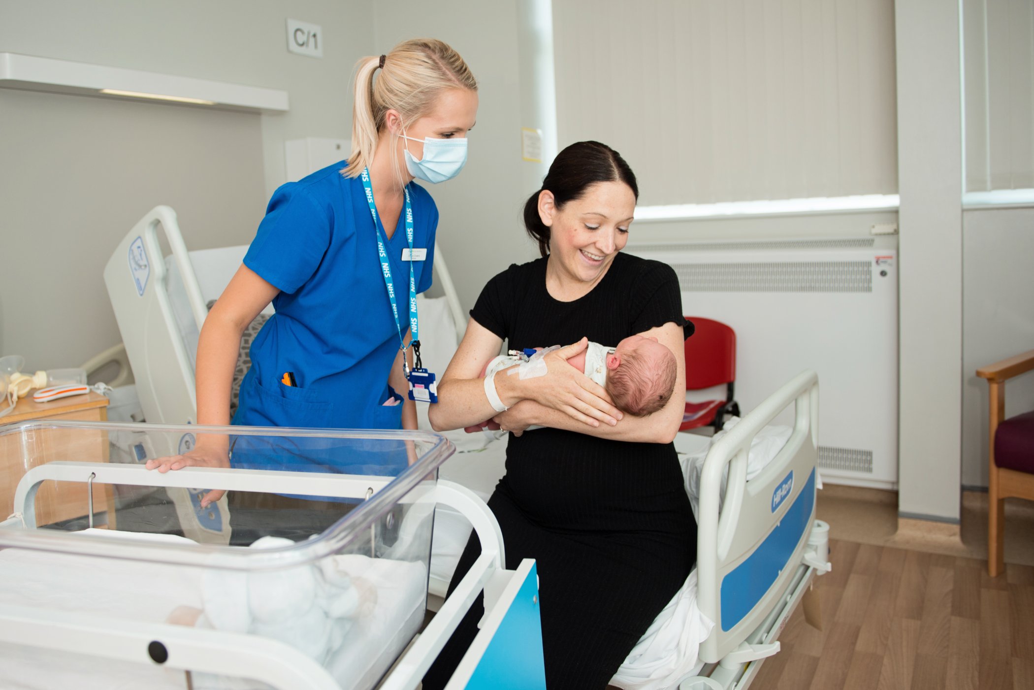 52. Maternity - staff with mum and baby.jpg