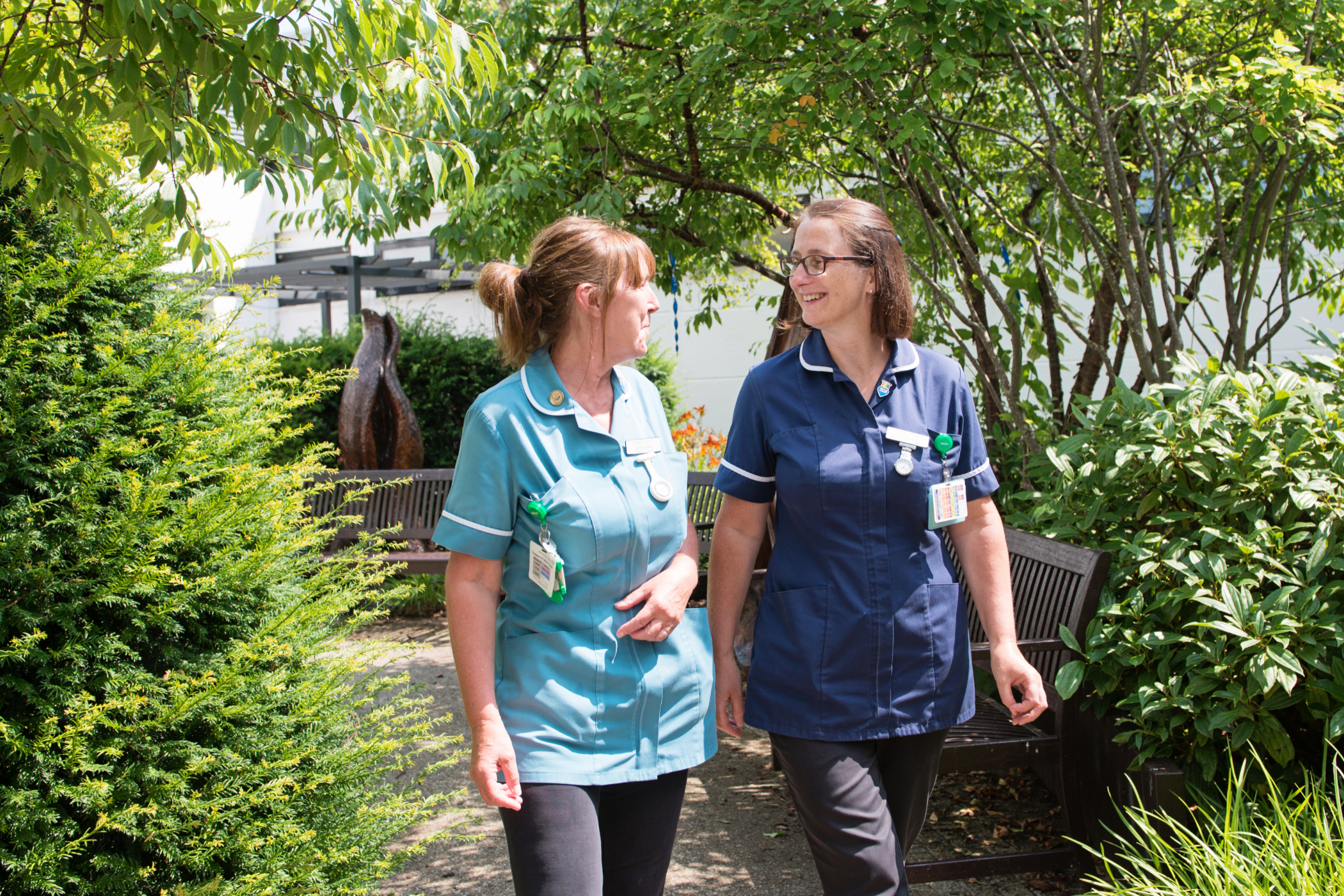 95. Staff outside in Macmillan garden.jpg